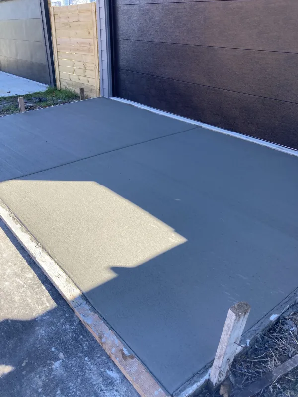 Finished concrete slab by Zuri Landscape LLC